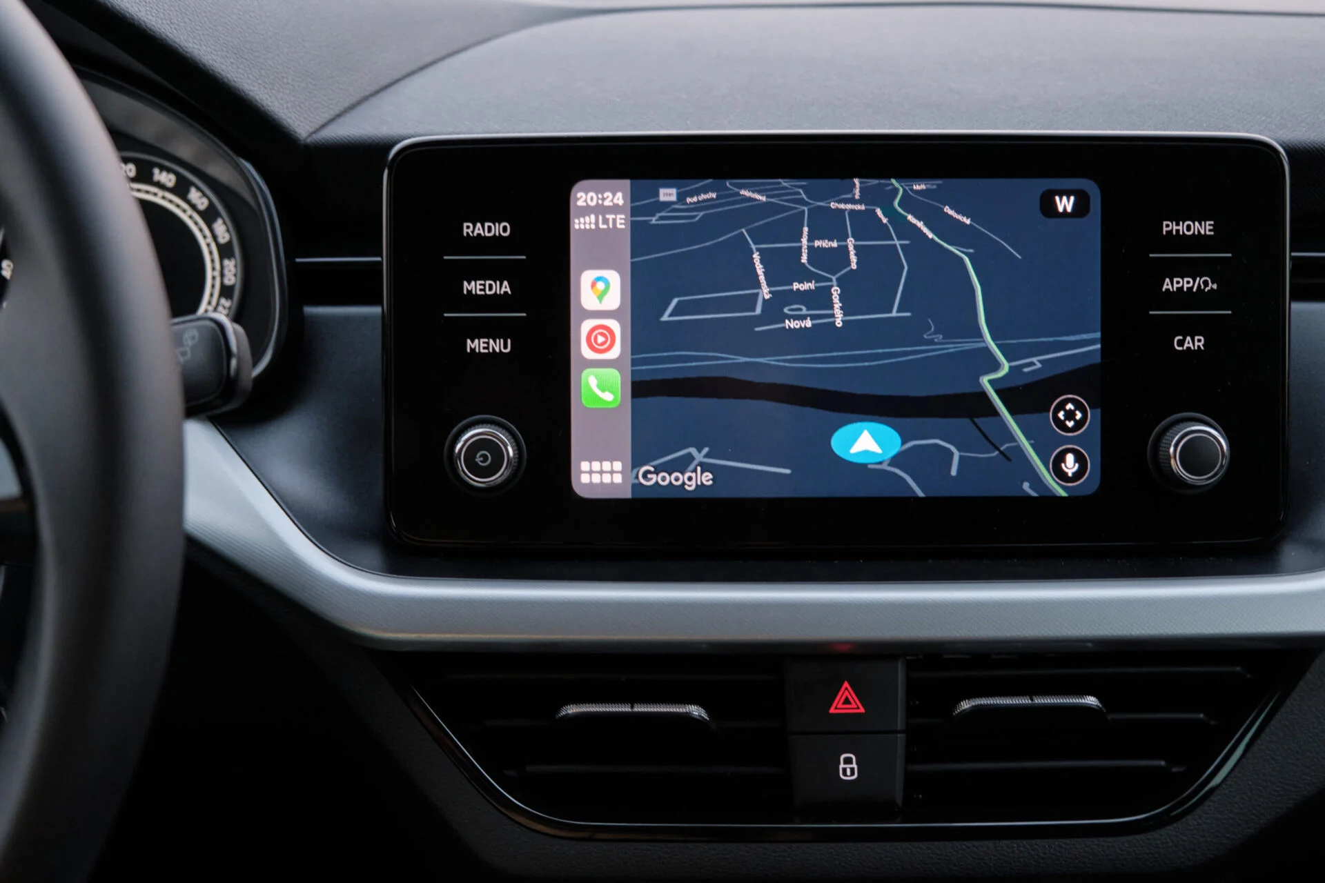 Car dashboard screen with application of navigation or maps