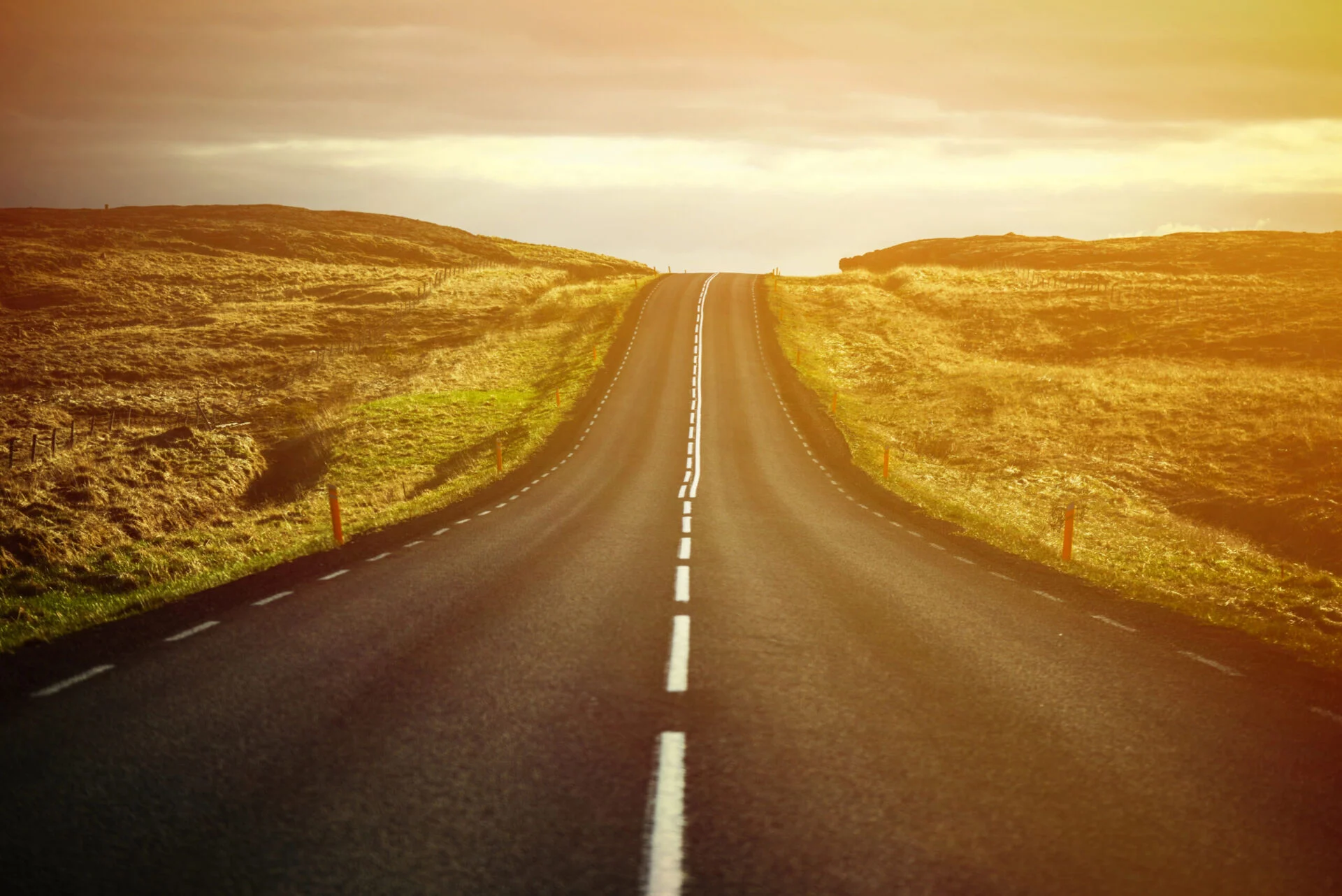 Empty road at sunset